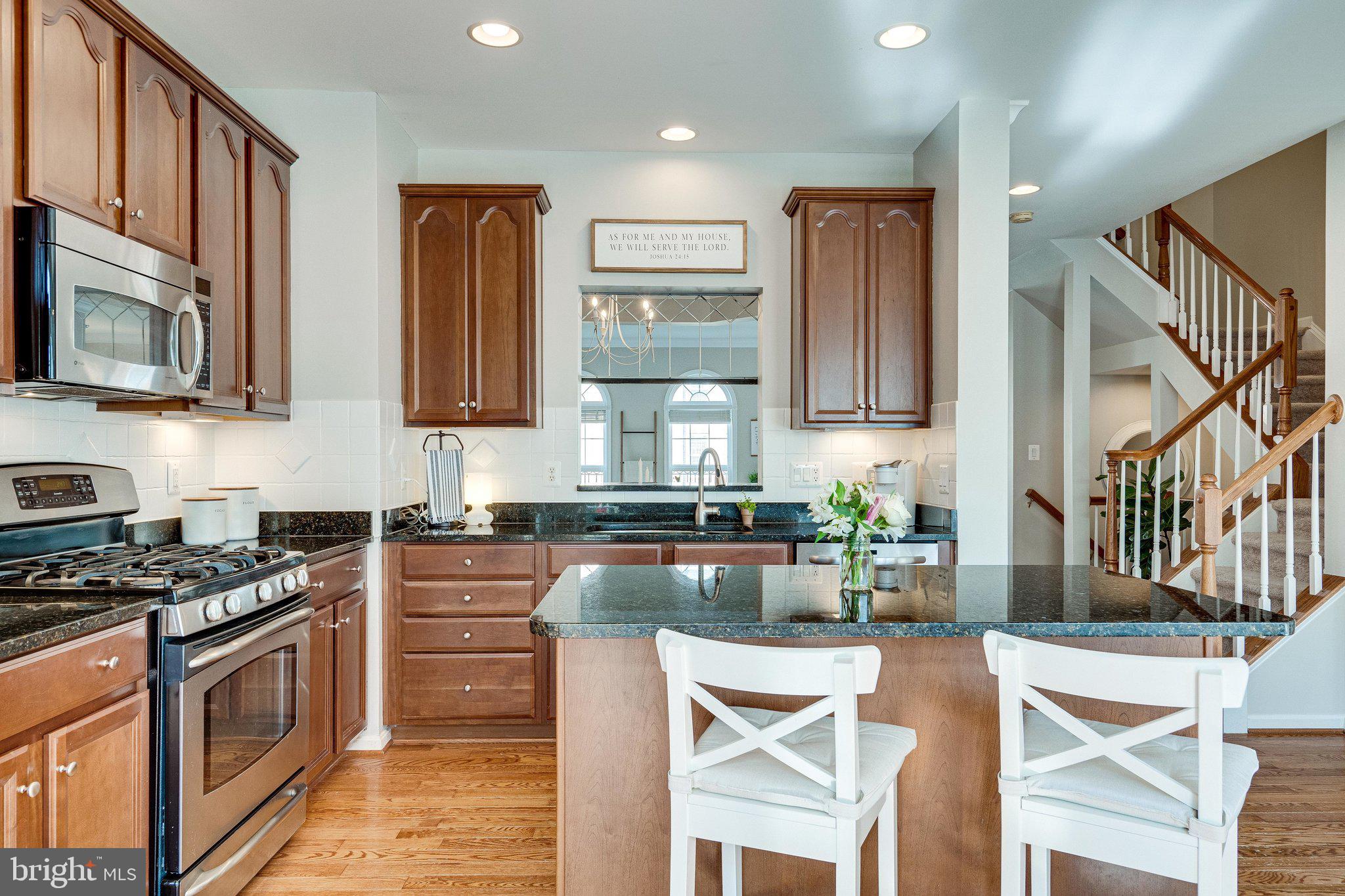 9167 Furey Road Lorton, VA 22079 - Photo 19 of 55 Kitchen island has an overhang for seating.