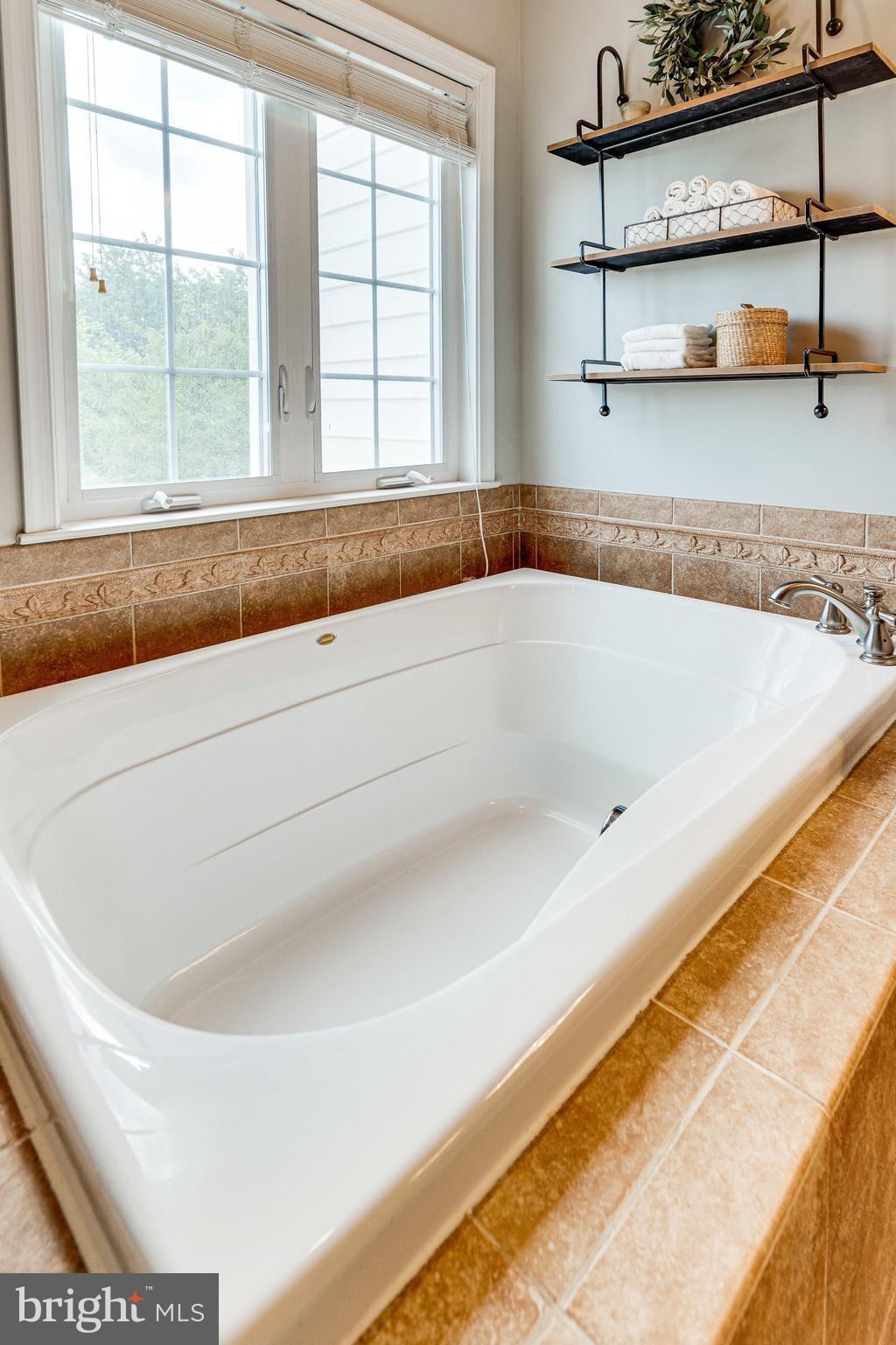 9167 Furey Road Lorton, VA 22079 - Photo 32 of 55 Jacuzzi soaking tub in the primary bathroom.