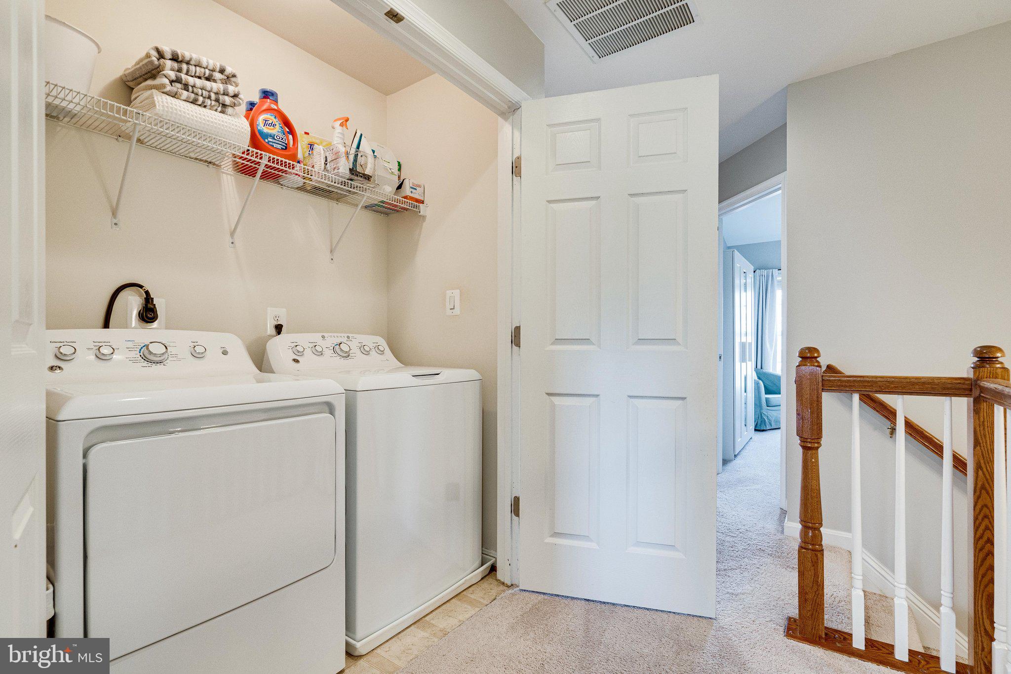 9167 Furey Road Lorton, VA 22079 - Photo 38 of 55 Full size laundry in the upstairs hallway.