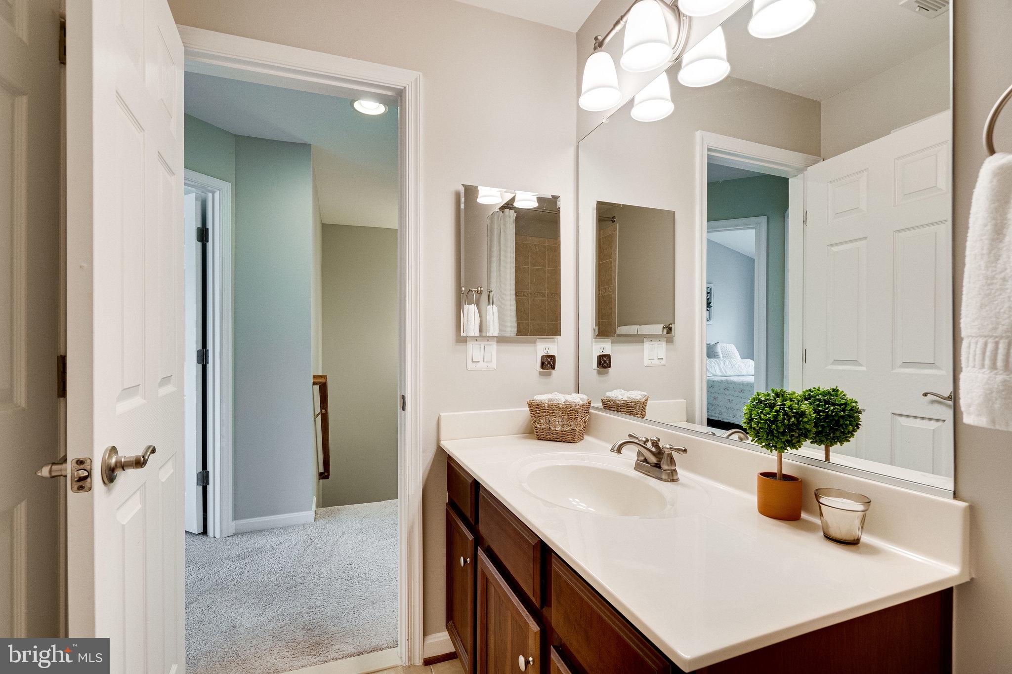 9167 Furey Road Lorton, VA 22079 - Photo 40 of 55 Generous counter space in the upstairs hall bath.