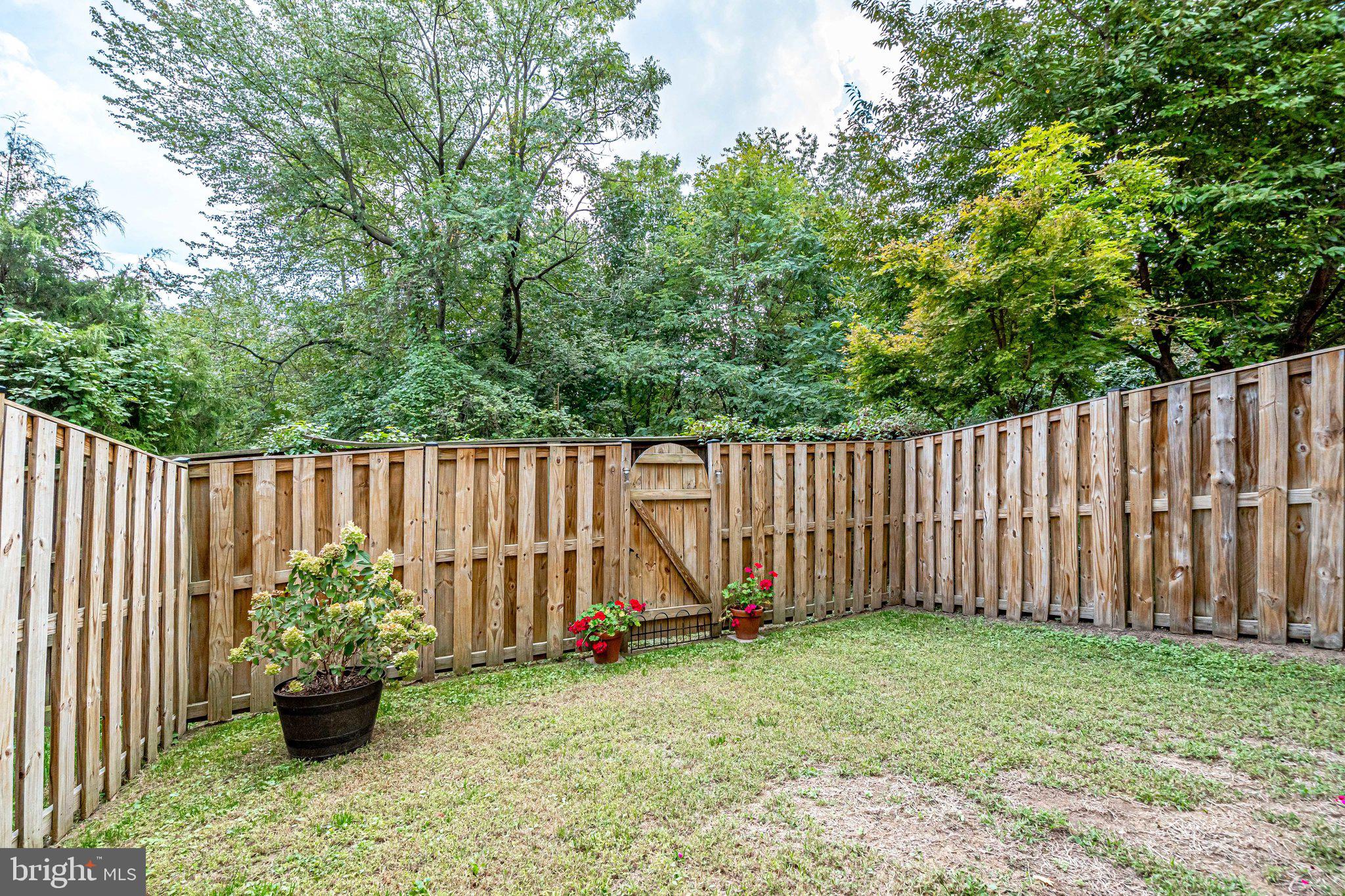9167 Furey Road Lorton, VA 22079 - Photo 49 of 55 Personal greenspace is fully fenced.