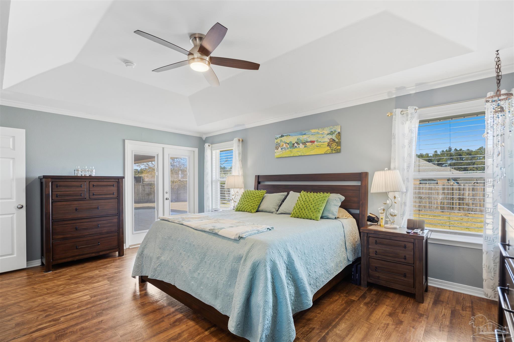 420 Collinwood Loop Foley, AL 36535 - Photo 23 of 63 a bed sitting in a spacious bedroom next to a window