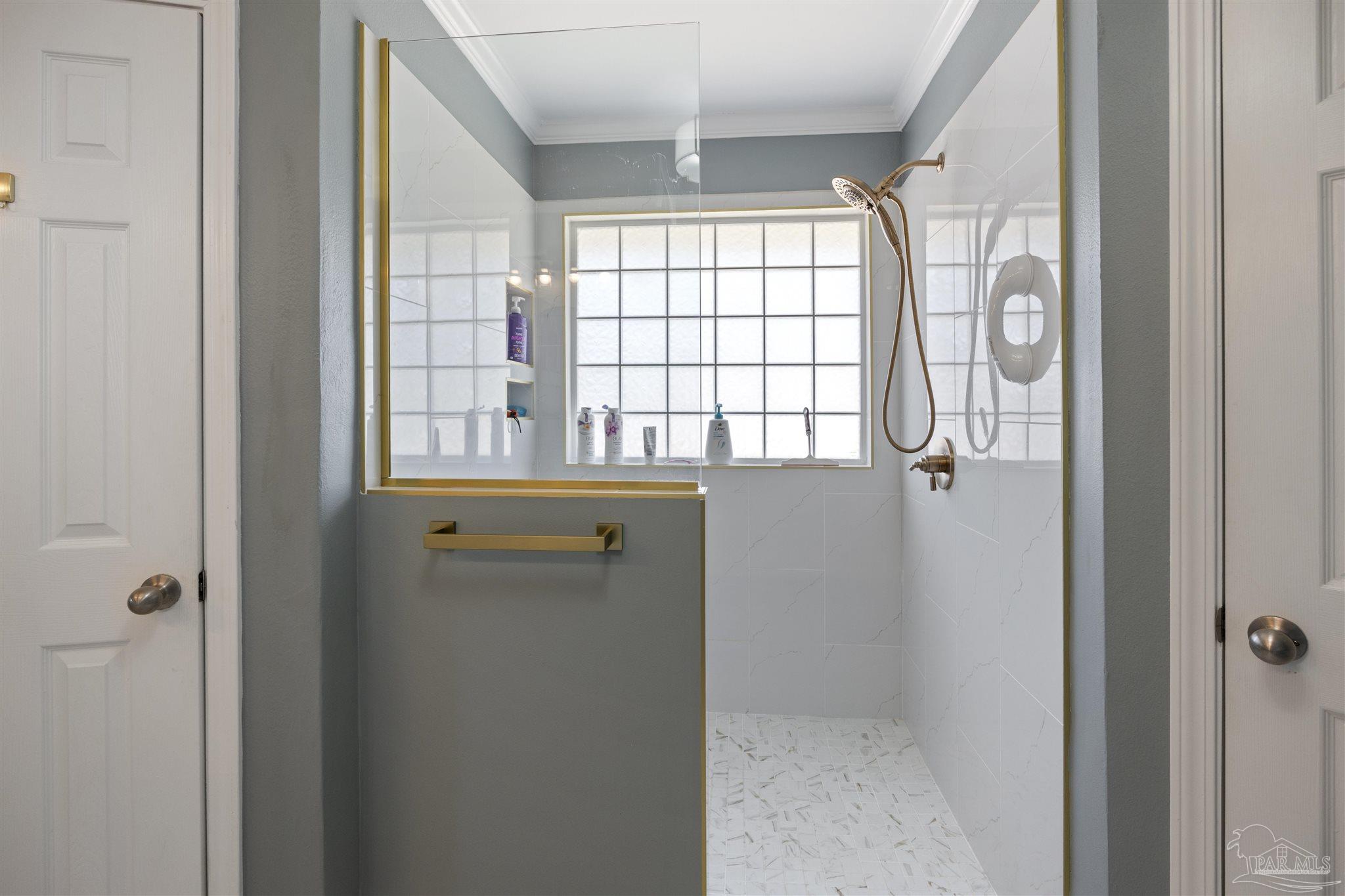 420 Collinwood Loop Foley, AL 36535 - Photo 27 of 63 a bathroom with a bathtub and a shower