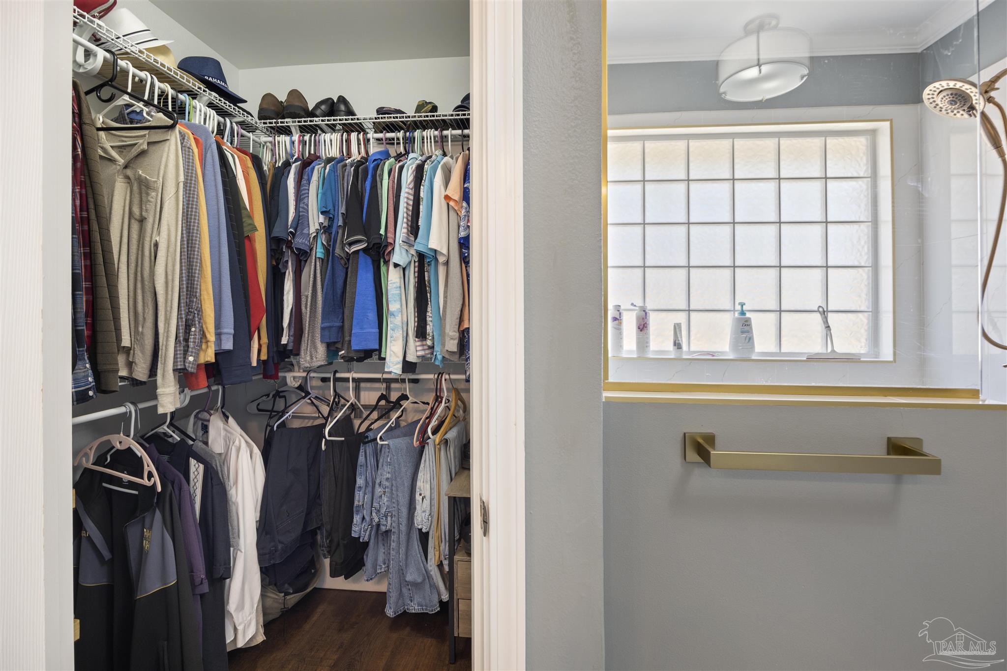 420 Collinwood Loop Foley, AL 36535 - Photo 31 of 63 a view of walk in closet with clothes