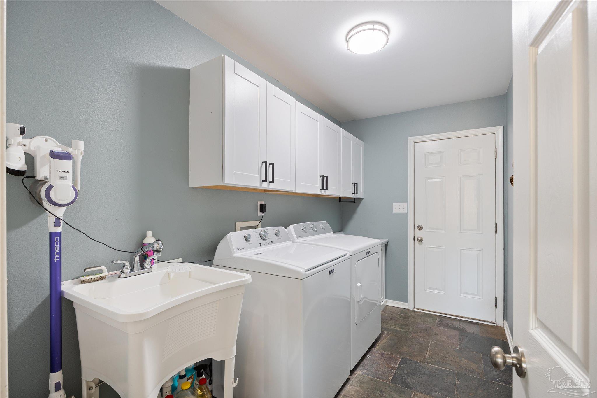 420 Collinwood Loop Foley, AL 36535 - Photo 38 of 63 a utility room with sink dryer and washer