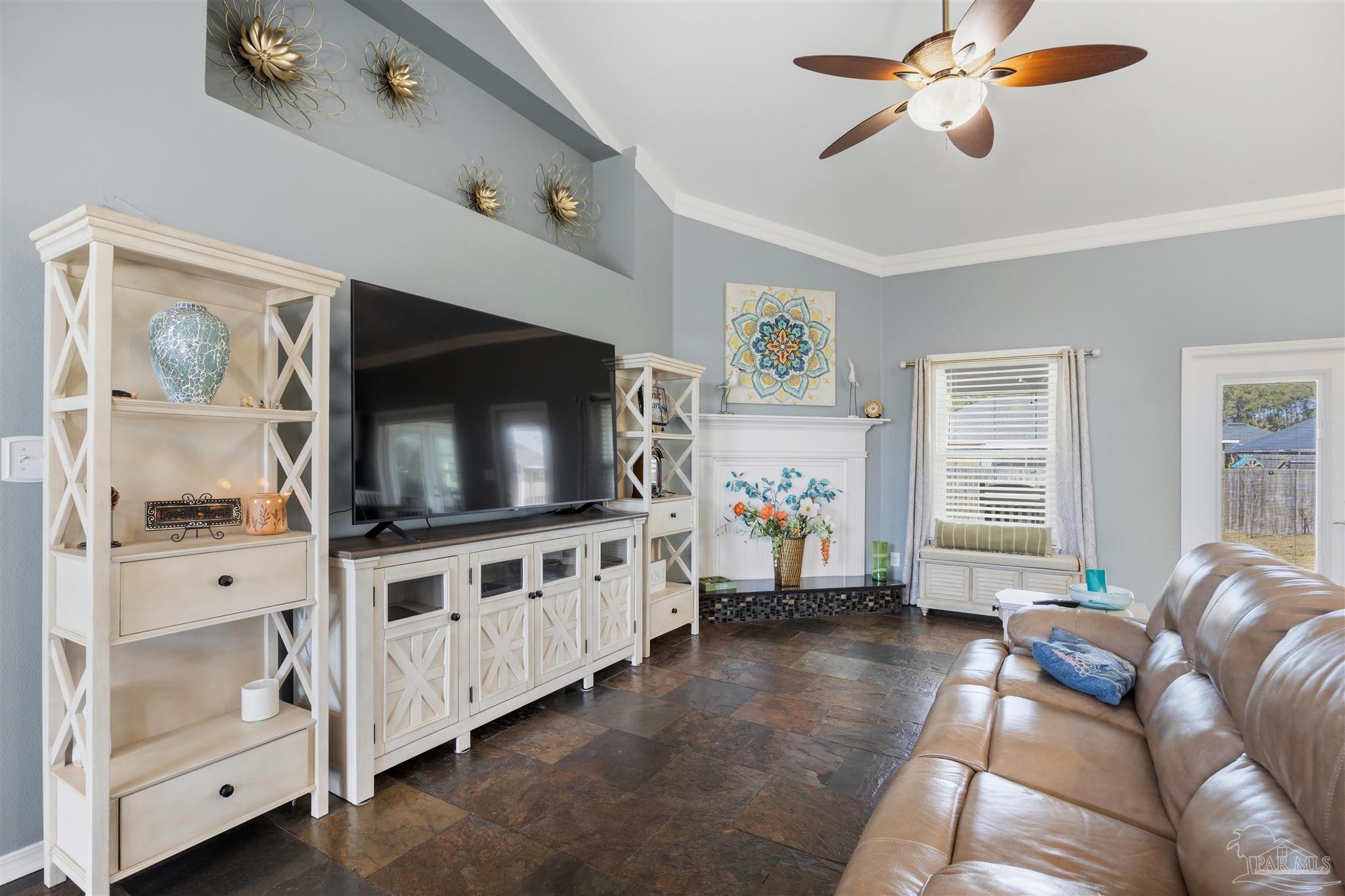 420 Collinwood Loop Foley, AL 36535 - Photo 8 of 63 a living room with furniture and a flat screen tv