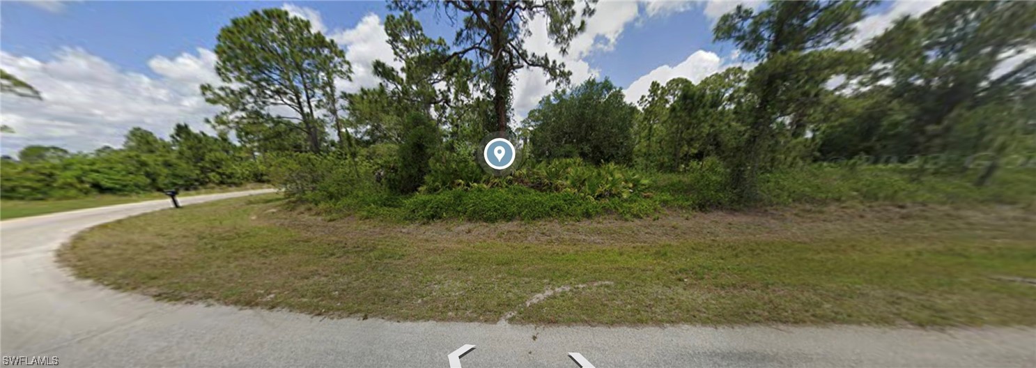 6525 Forest Circle LaBelle, FL 33935 - Photo 2 of 6 a view of outdoor space and yard