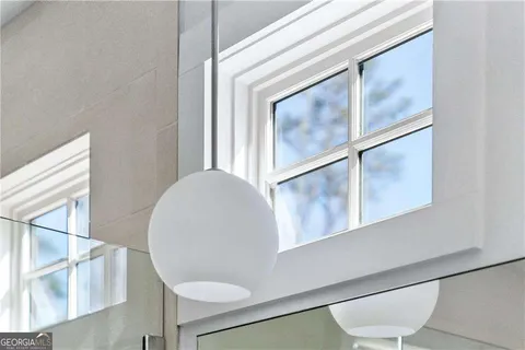 a bathroom with a sink a mirror and a bathtub