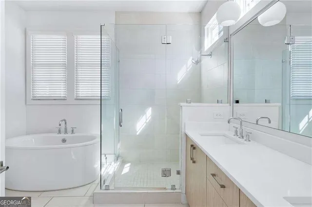 a close view of a faucet a sink and a mirror