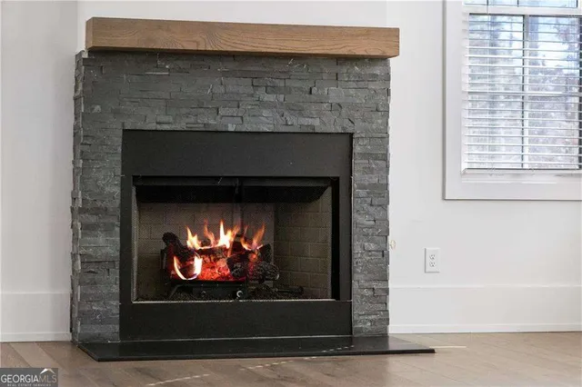 a living room with a fireplace