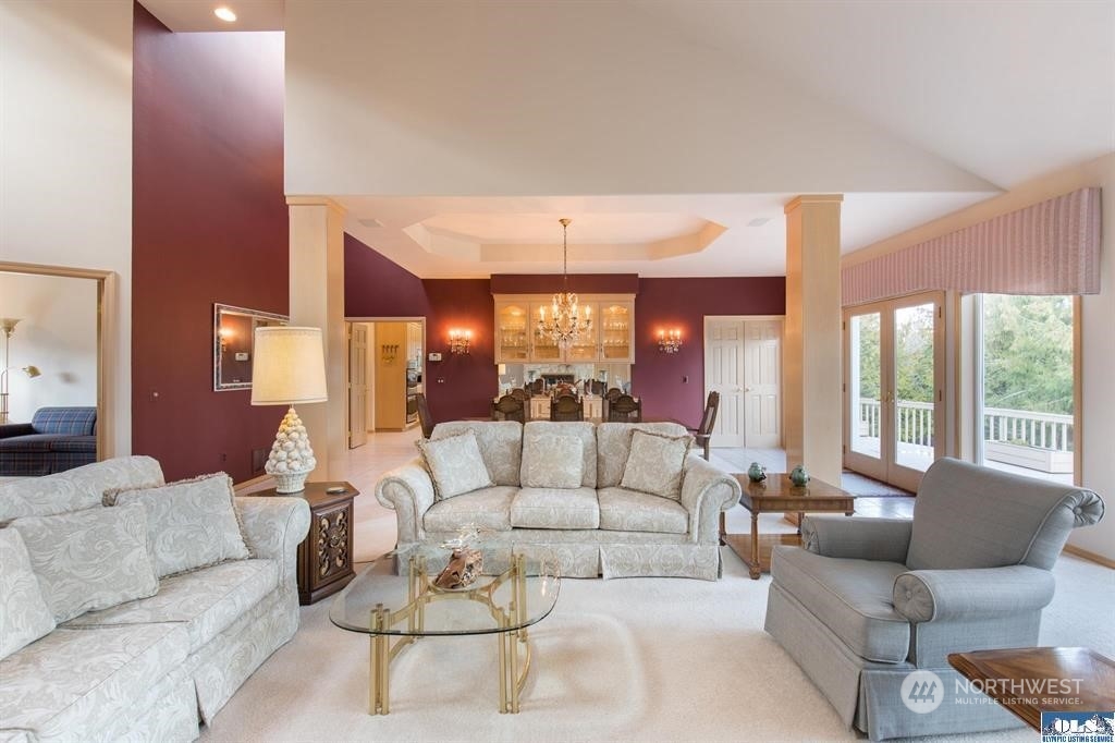 485 Doe Run Road Sequim, WA 98382 - Photo 15 of 40 a living room with furniture and a large window