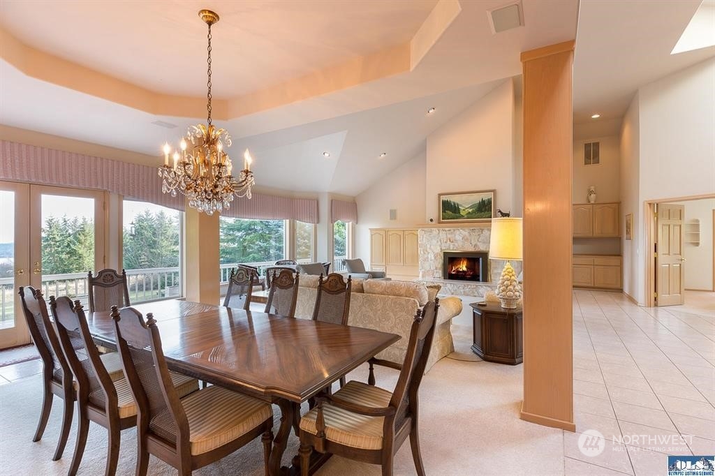 485 Doe Run Road Sequim, WA 98382 - Photo 17 of 40 a view of a dining room with furniture window and outside view