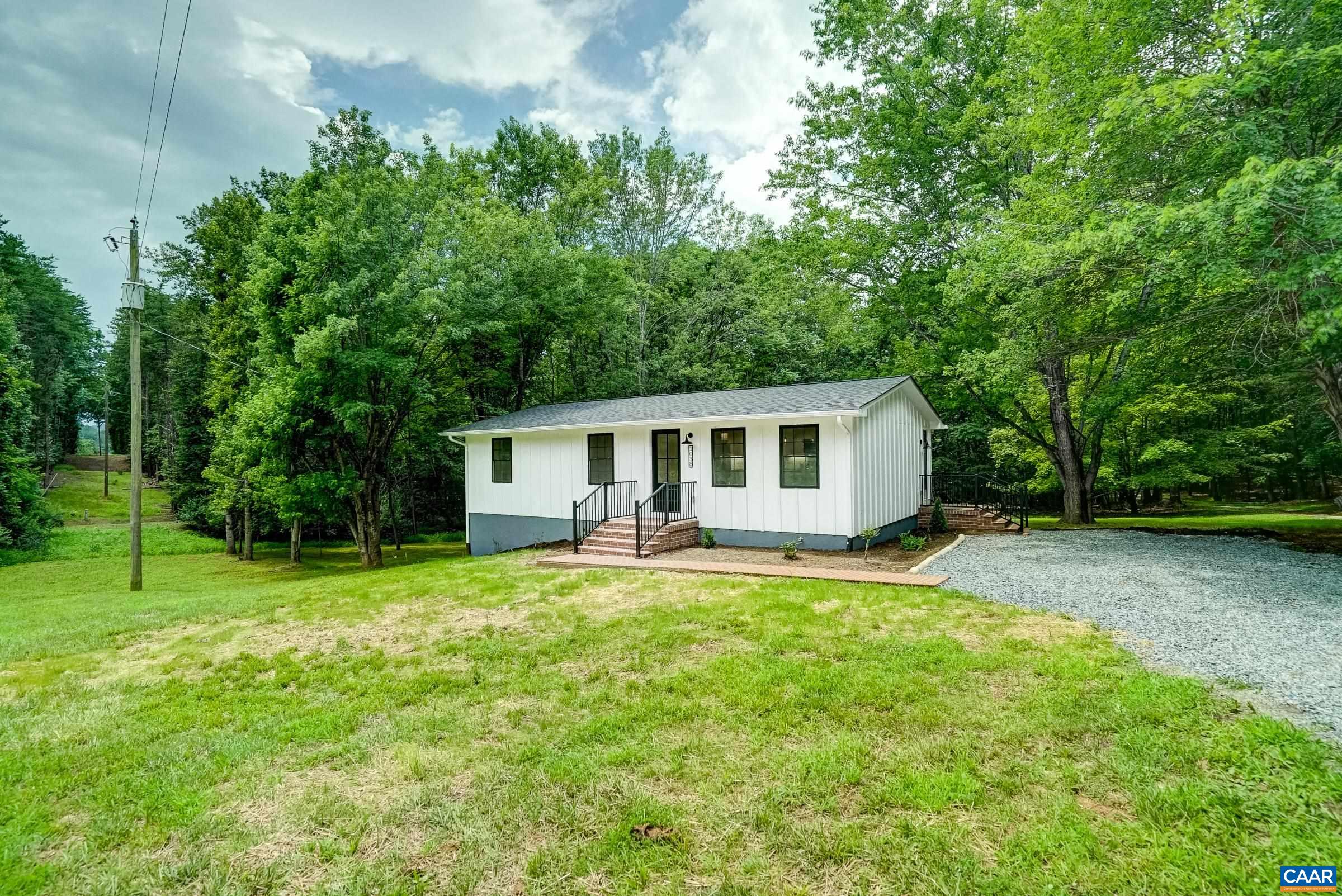 1038 Smith Road Afton, VA 22920 - Photo 3 of 49 a front view of a house with a yard and trees