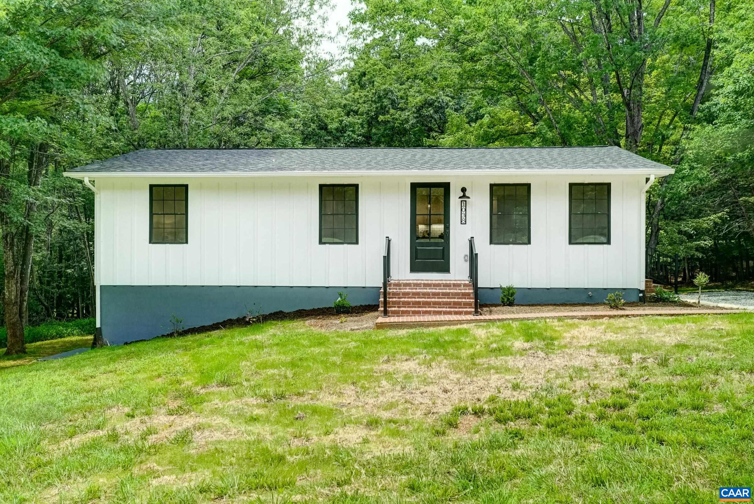 1038 Smith Road Afton, VA 22920 - Photo 47 of 49 a view of a house with yard and trees in the background