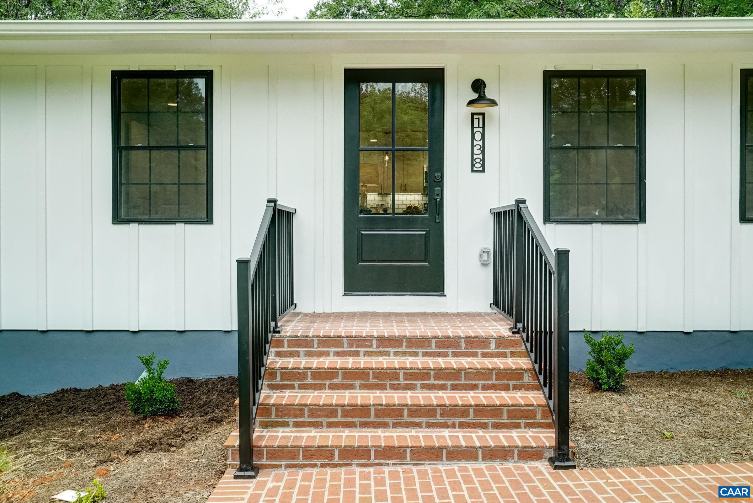 1038 Smith Road Afton, VA 22920 - Photo 6 of 49 a front view of a house with a garden