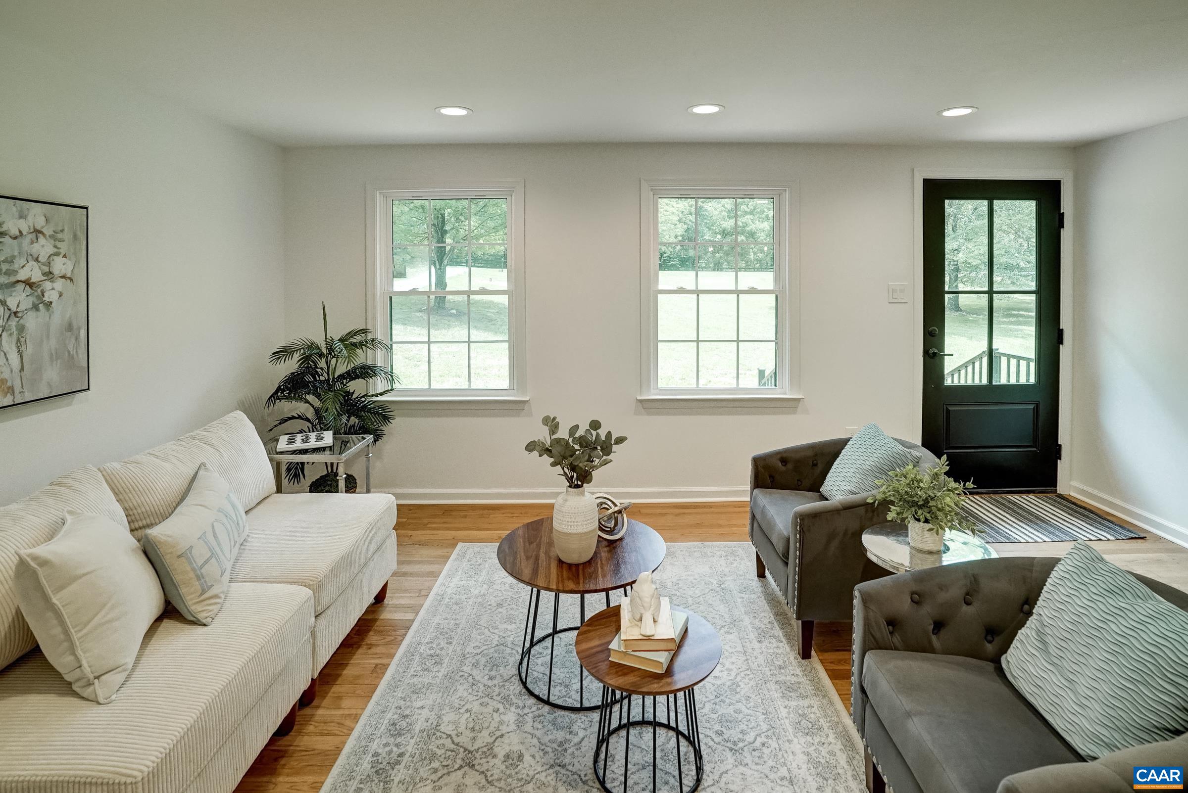 1038 Smith Road Afton, VA 22920 - Photo 9 of 49 a living room with furniture potted plant and a window