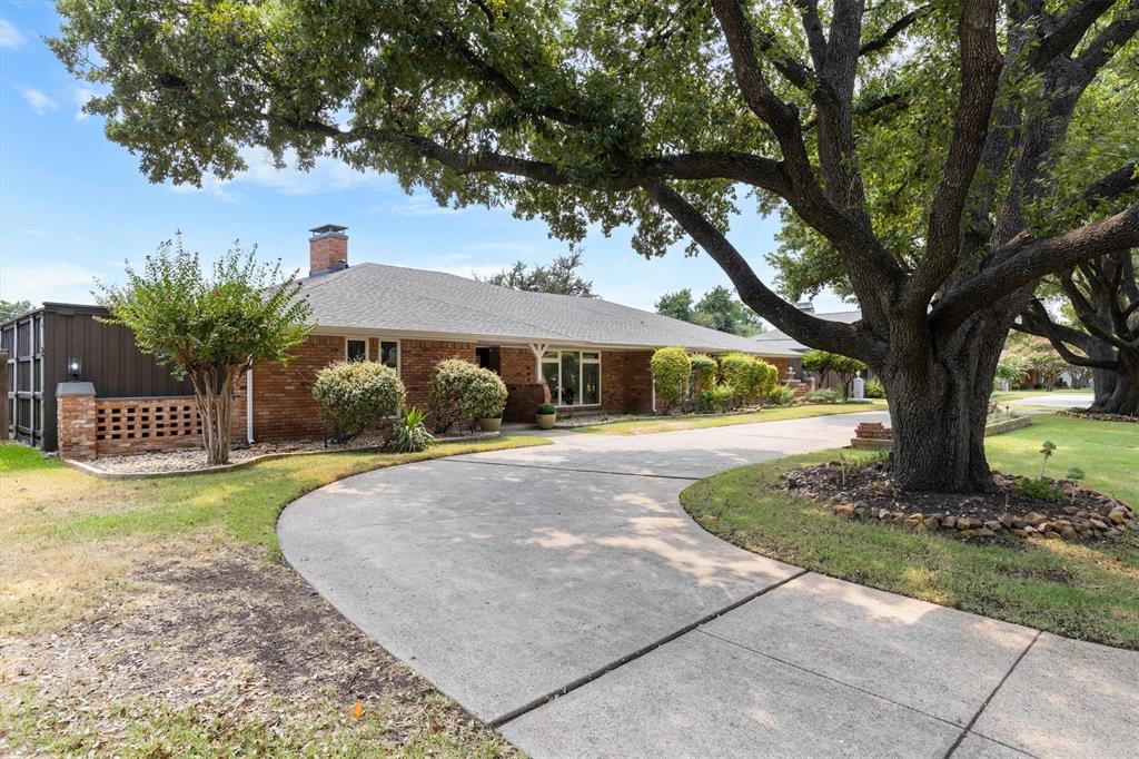 4446 Thunder Road Dallas, TX 75244 - Photo 7 of 36 Brick exterior with circular drive and mature trees