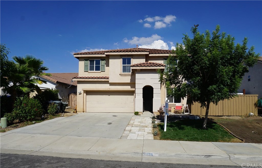 216 South Ralph Road Lake Elsinore, CA 92530 - Photo 1 of 1 ROSE BUSH ON THE LEFT SIDE OF THE DRIVEWAY IS GORGEOUS WHEN IN BLOOM!