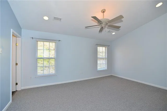 a bathroom with a glass door shower