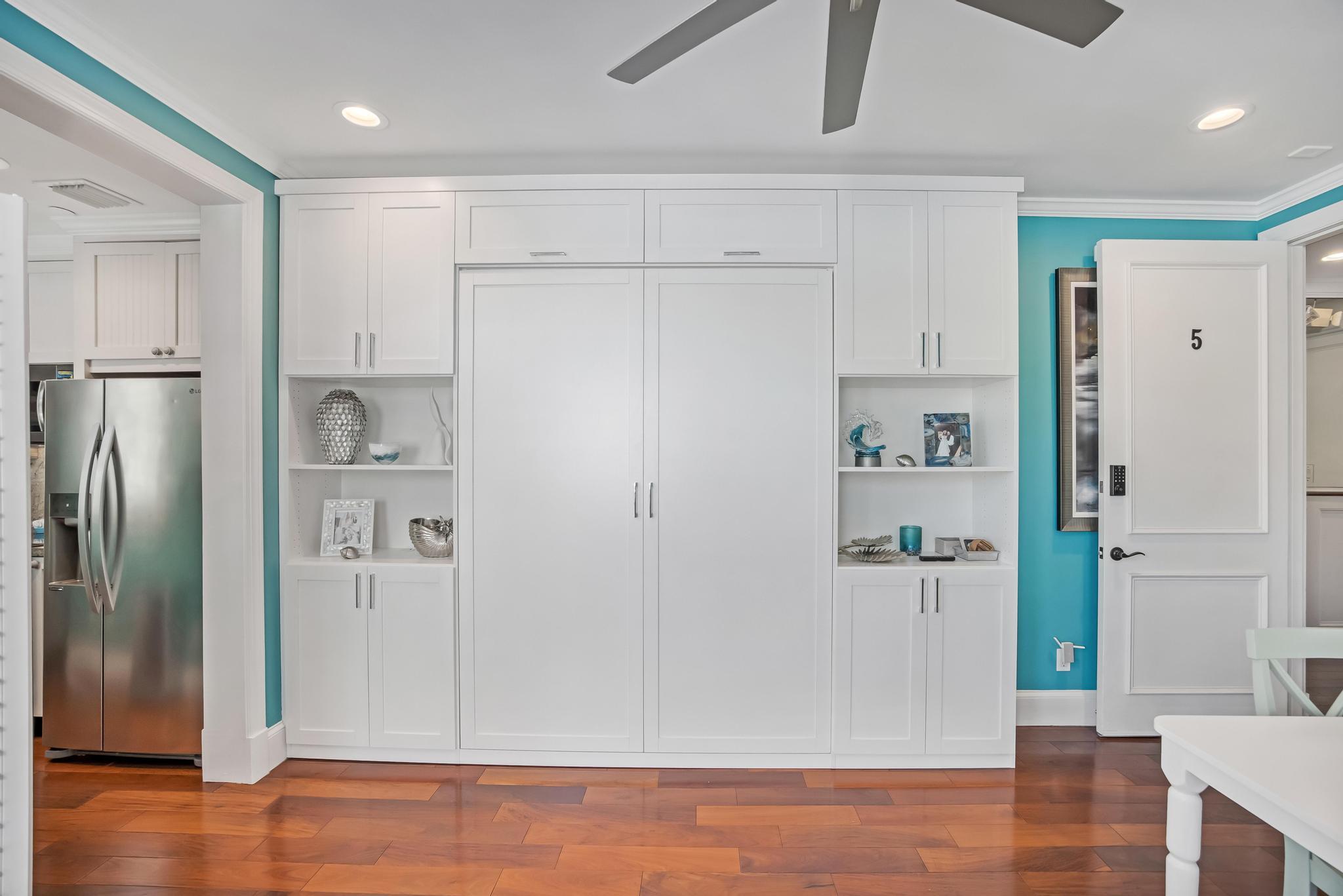 616 Caroline Street, Unit 5 Key West, FL 33040 - Photo 18 of 41 a view of kitchen space with wooden floor