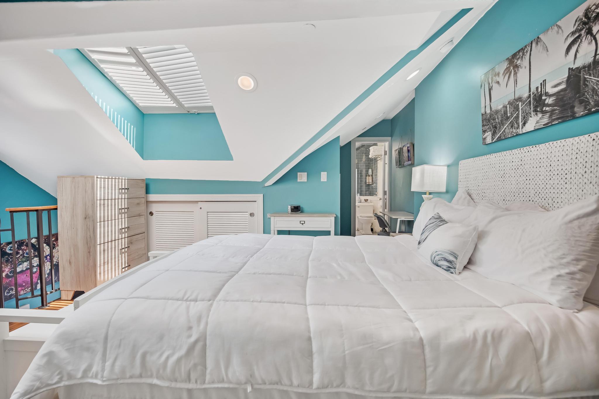 616 Caroline Street, Unit 5 Key West, FL 33040 - Photo 31 of 41 a large white bed in a white room