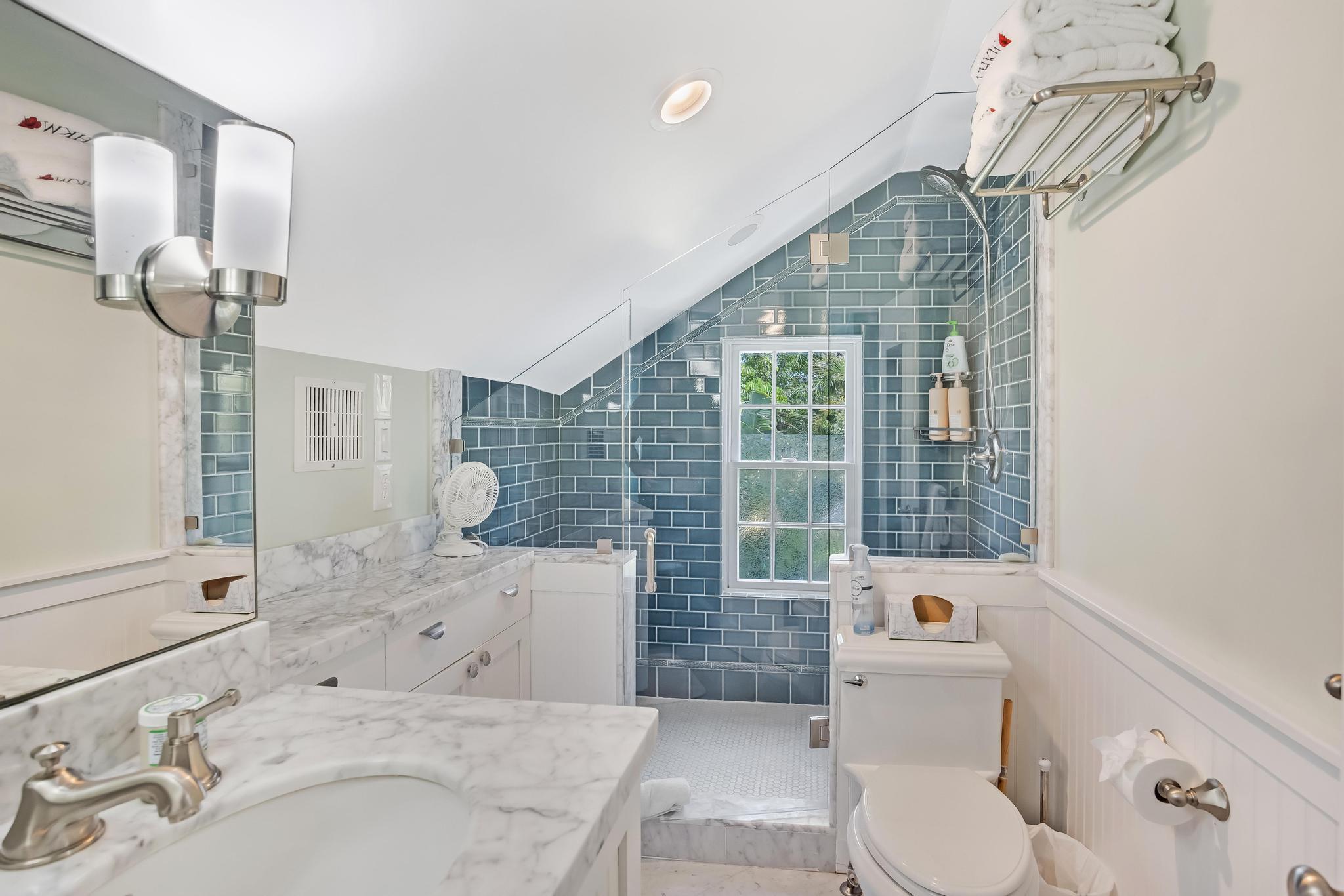 616 Caroline Street, Unit 5 Key West, FL 33040 - Photo 34 of 41 a bathroom with a sink a toilet and shower
