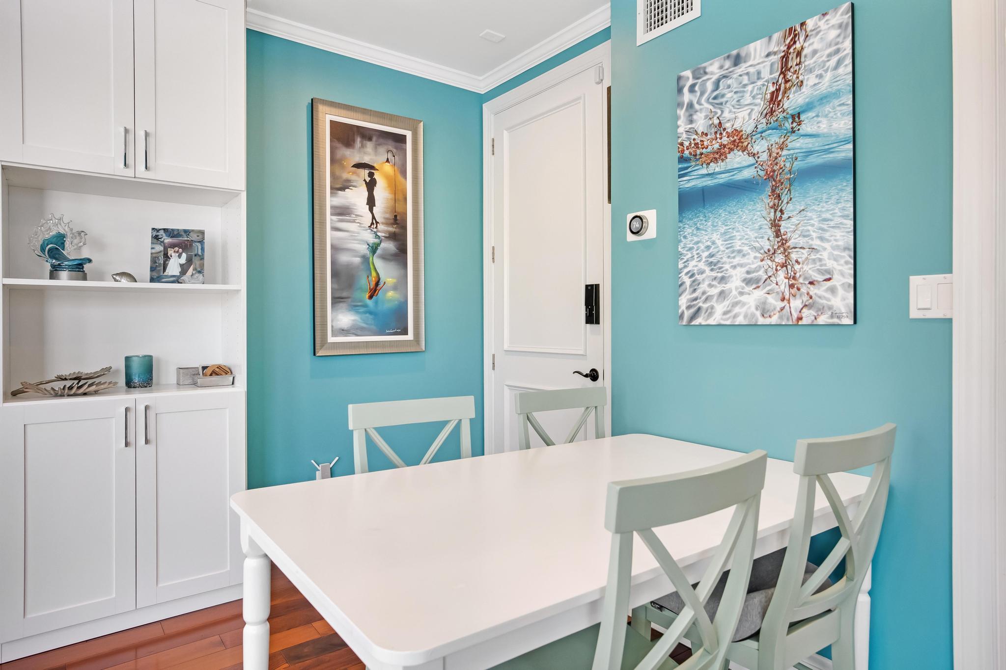 616 Caroline Street, Unit 5 Key West, FL 33040 - Photo 5 of 41 a view of a dining room with furniture