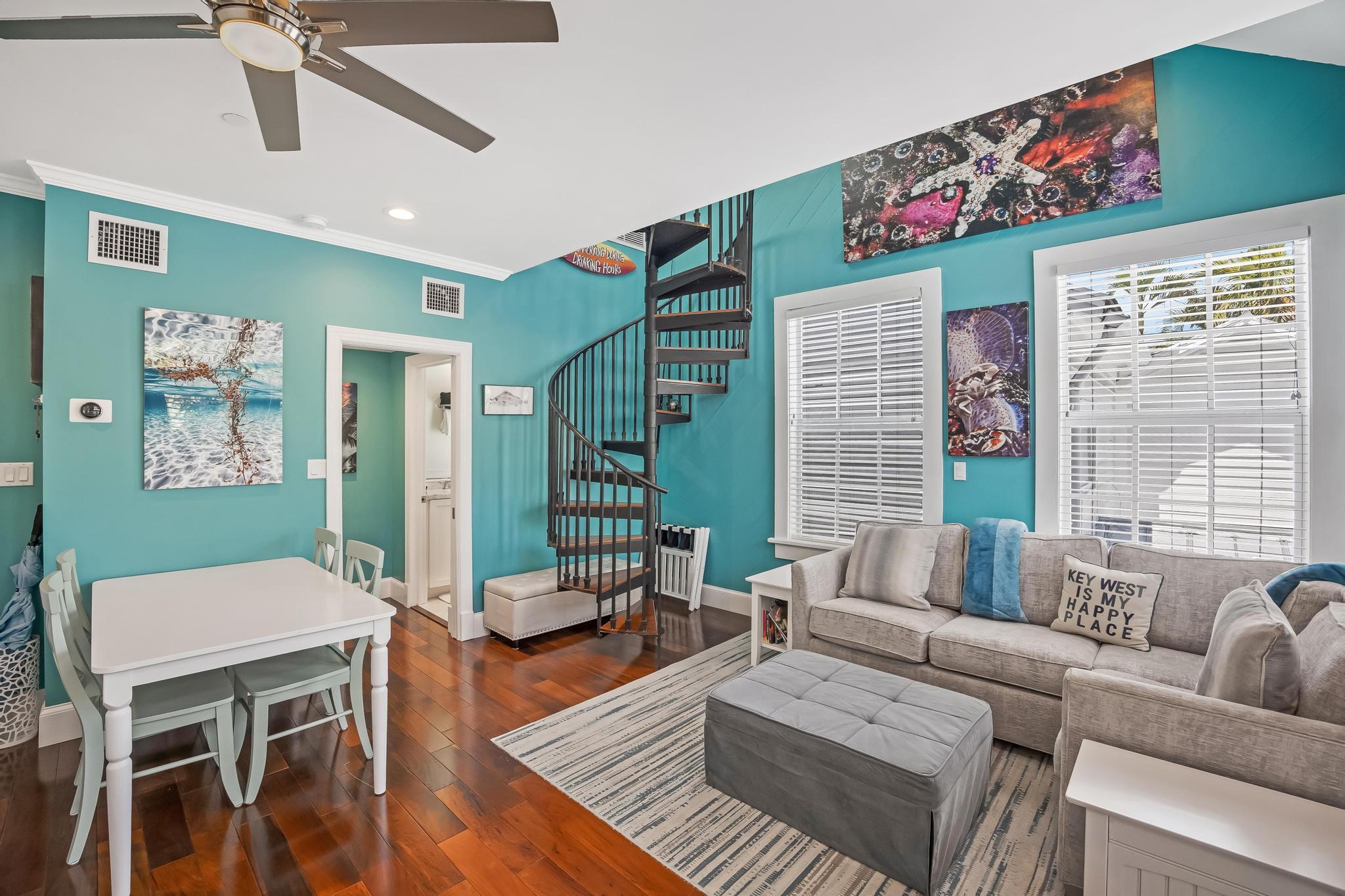 616 Caroline Street, Unit 5 Key West, FL 33040 - Photo 6 of 41 a living room with furniture and a large window