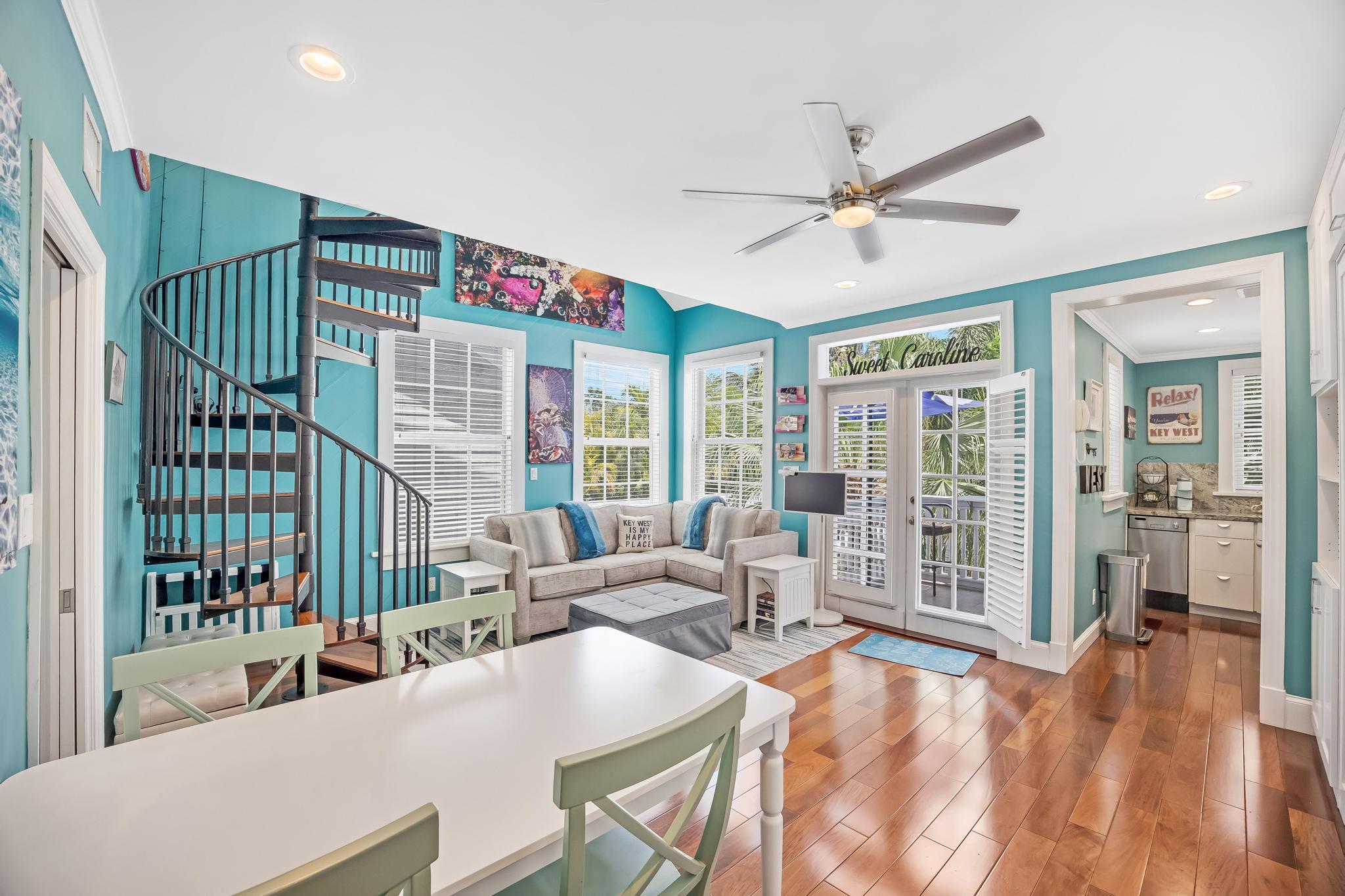 616 Caroline Street, Unit 5 Key West, FL 33040 - Photo 7 of 41 a living room with furniture and a large window