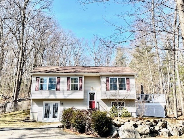 13 Oxbow Road Oxford, MA 01537 - Photo 1 of 31 a front view of a house with a yard