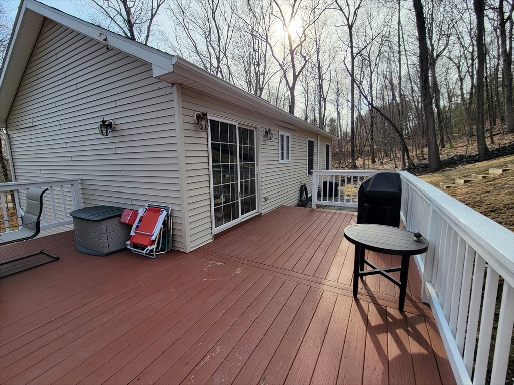 13 Oxbow Road Oxford, MA 01537 - Photo 6 of 31 a backyard of a house with table and chairs
