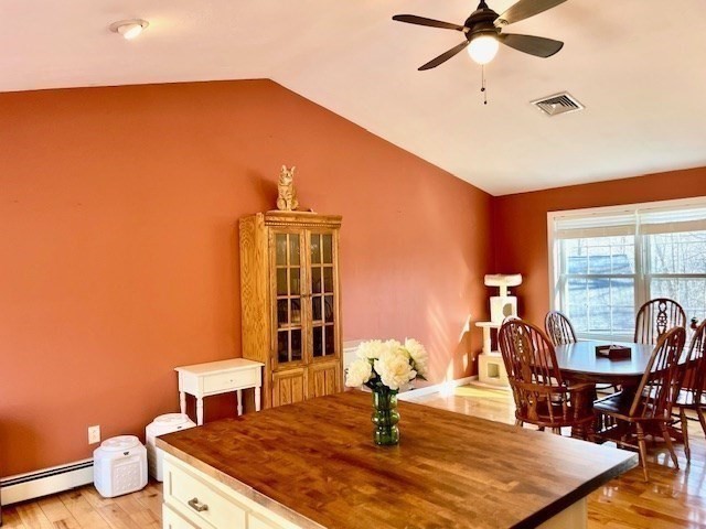 13 Oxbow Road Oxford, MA 01537 - Photo 8 of 31 a living room with a table and chairs