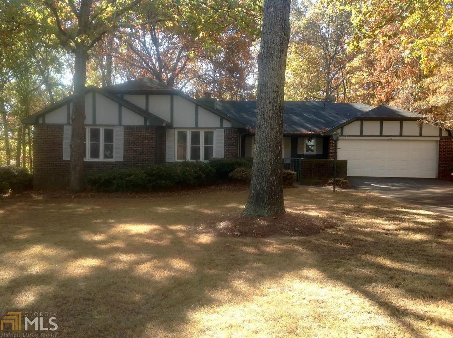 215 Margo Trail Southeast Rome, GA 30161 - Photo 1 of 1 a view of a house with a yard