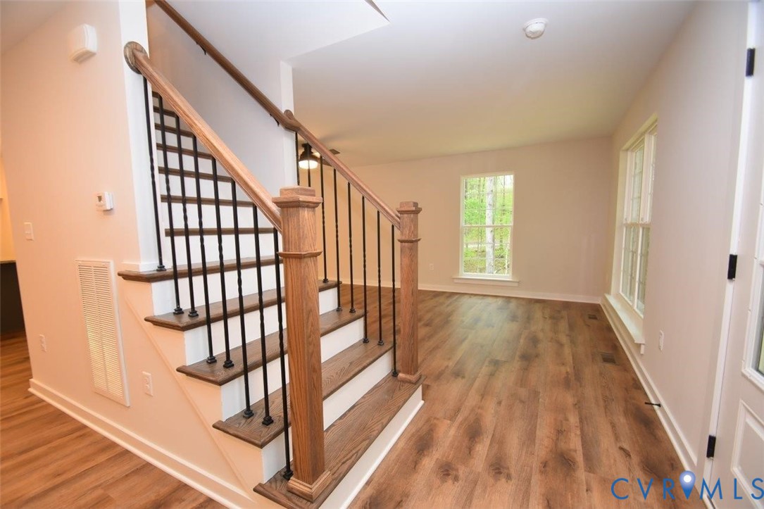 1749 Hollands Road Palmyra, VA 22963 - Photo 18 of 40 Staircase featuring wood finished floors and baseb