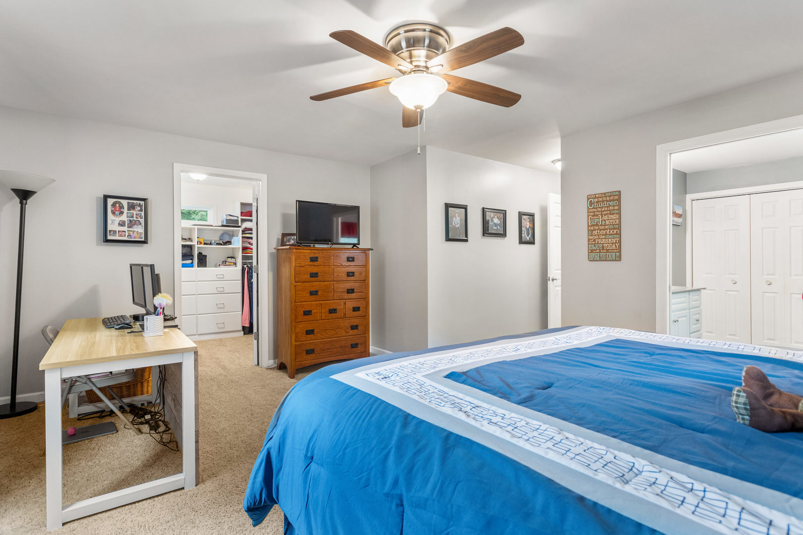 110 5th Street Ivesdale, IL 61851 - Photo 16 of 37 a bedroom with a bed and a table in it