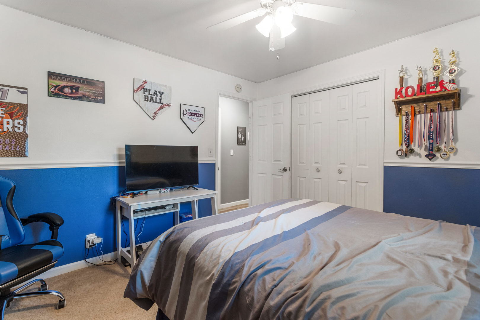 110 5th Street Ivesdale, IL 61851 - Photo 20 of 37 a bedroom with a bed and a flat screen tv