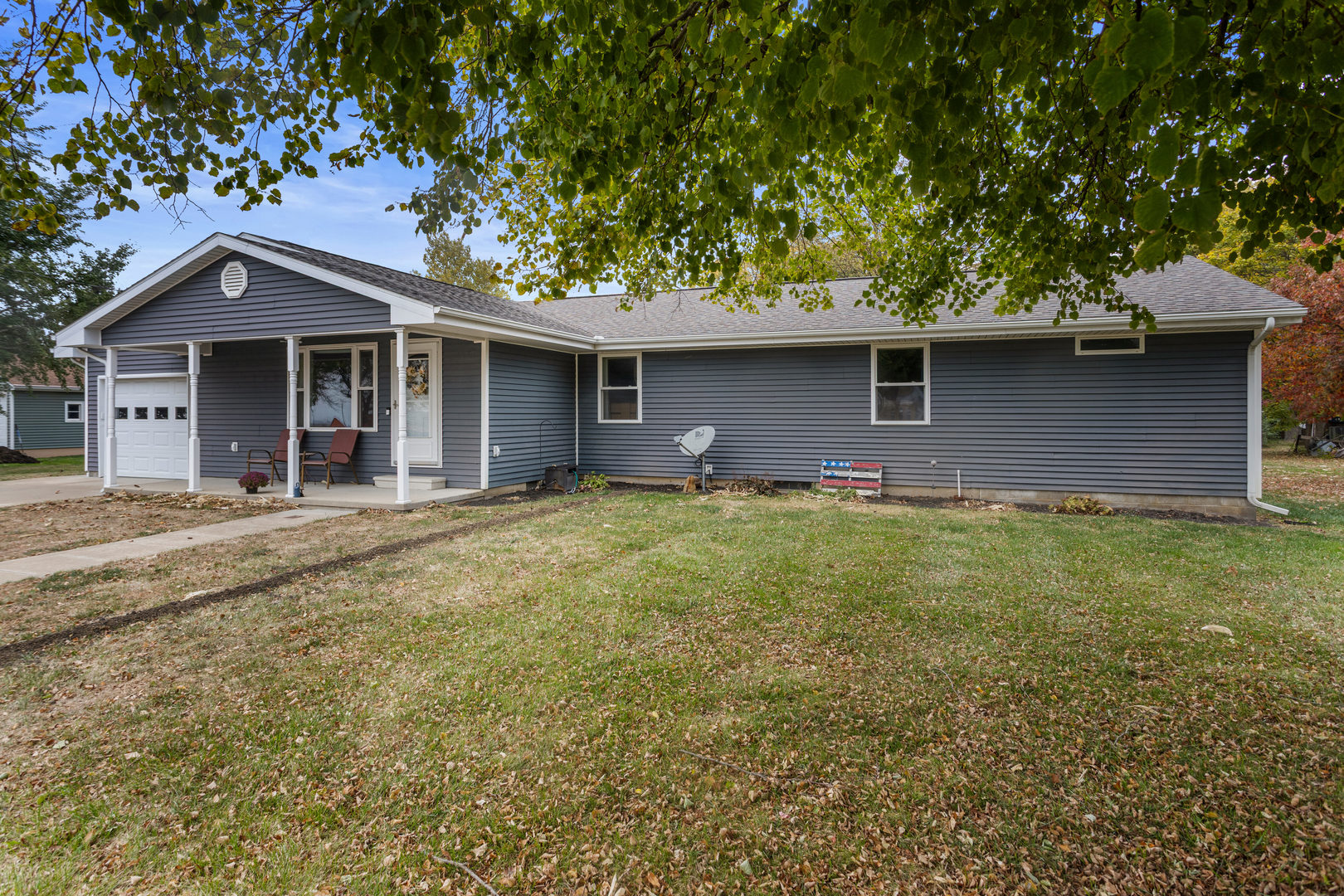 110 5th Street Ivesdale, IL 61851 - Photo 2 of 37 a front view of a house with garden
