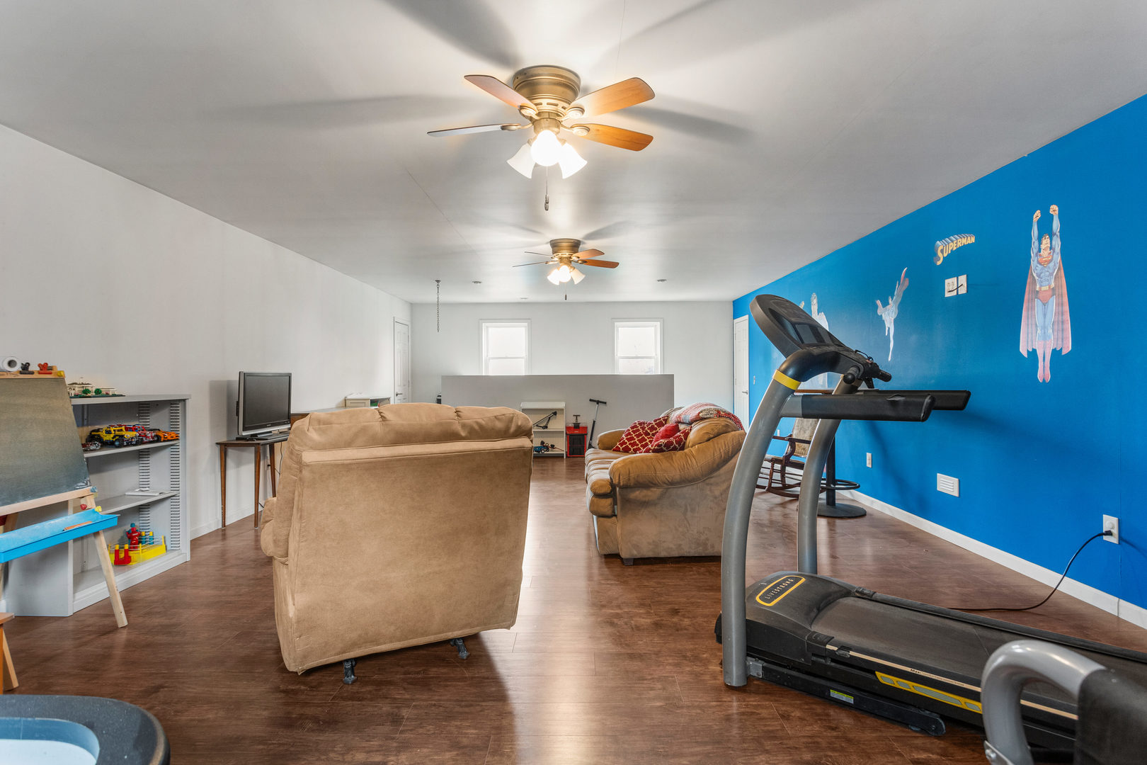 110 5th Street Ivesdale, IL 61851 - Photo 34 of 37 a living room with furniture and a chandelier
