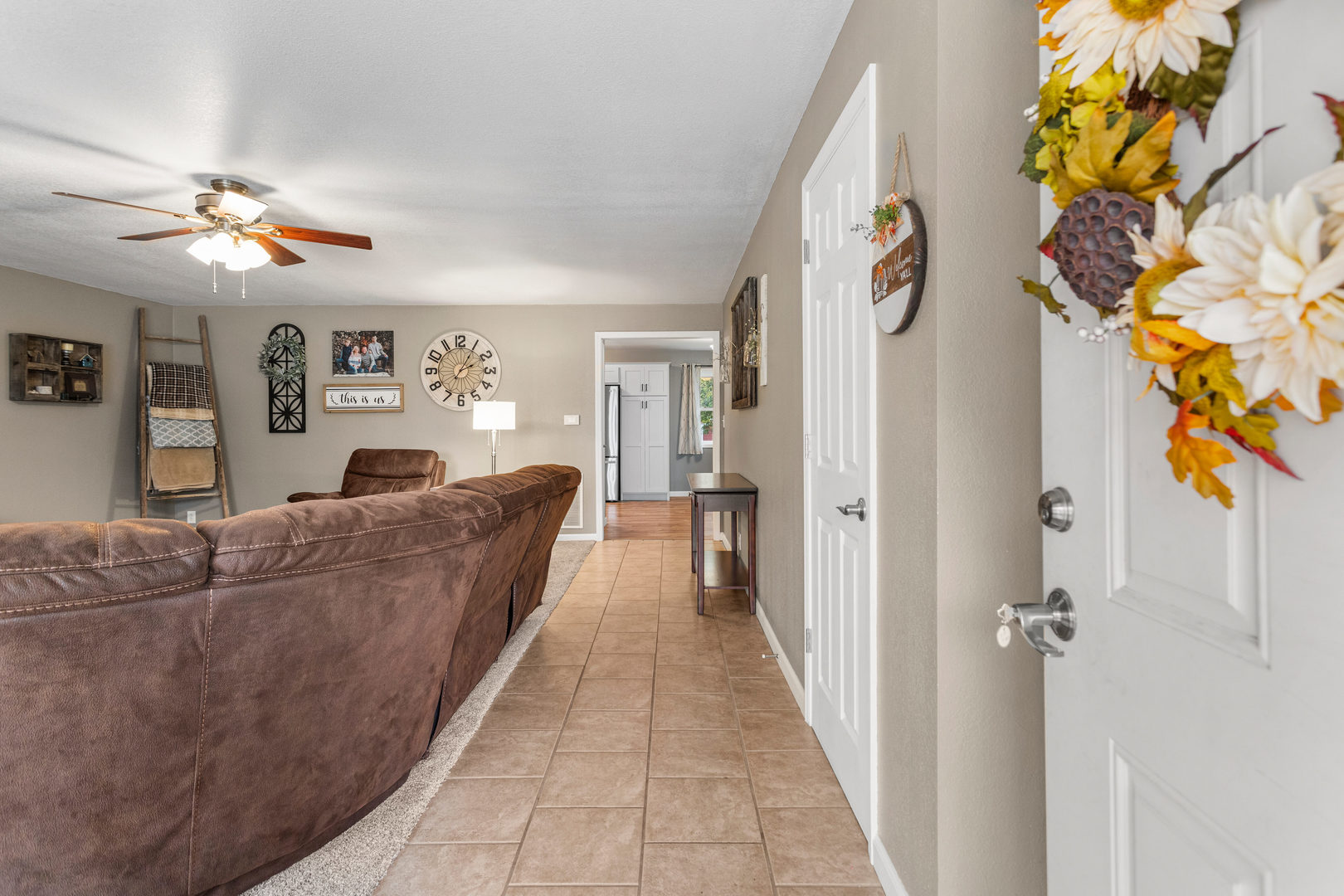 110 5th Street Ivesdale, IL 61851 - Photo 5 of 37 a living room with furniture and a chandelier