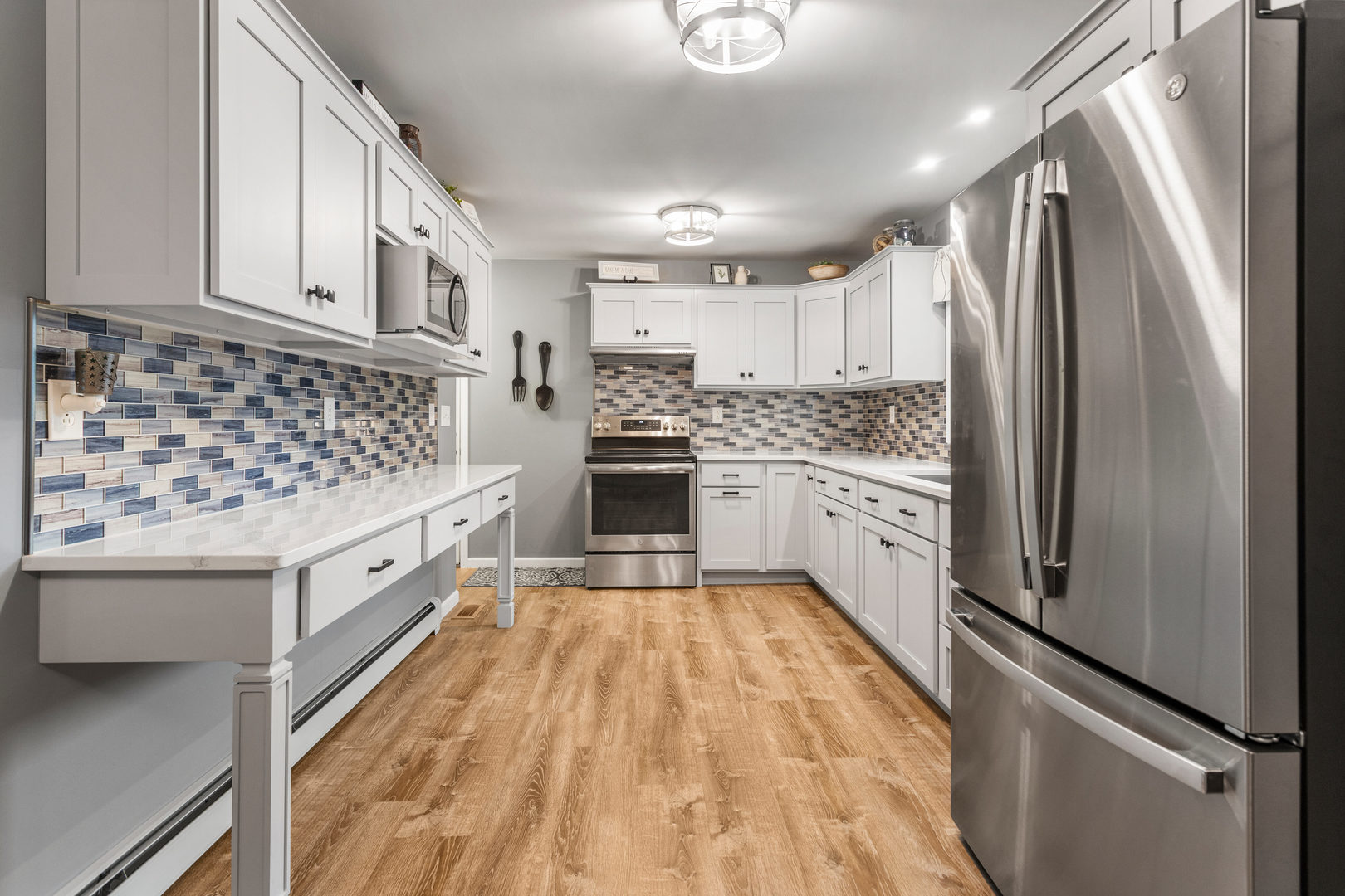 110 5th Street Ivesdale, IL 61851 - Photo 10 of 37 a large kitchen with a stove and refrigerator