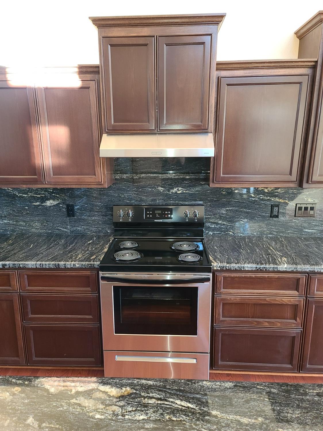 2805 Mason Road Rail Road Flat, CA 95248 - Photo 20 of 75 a stove top oven sitting inside of a kitchen