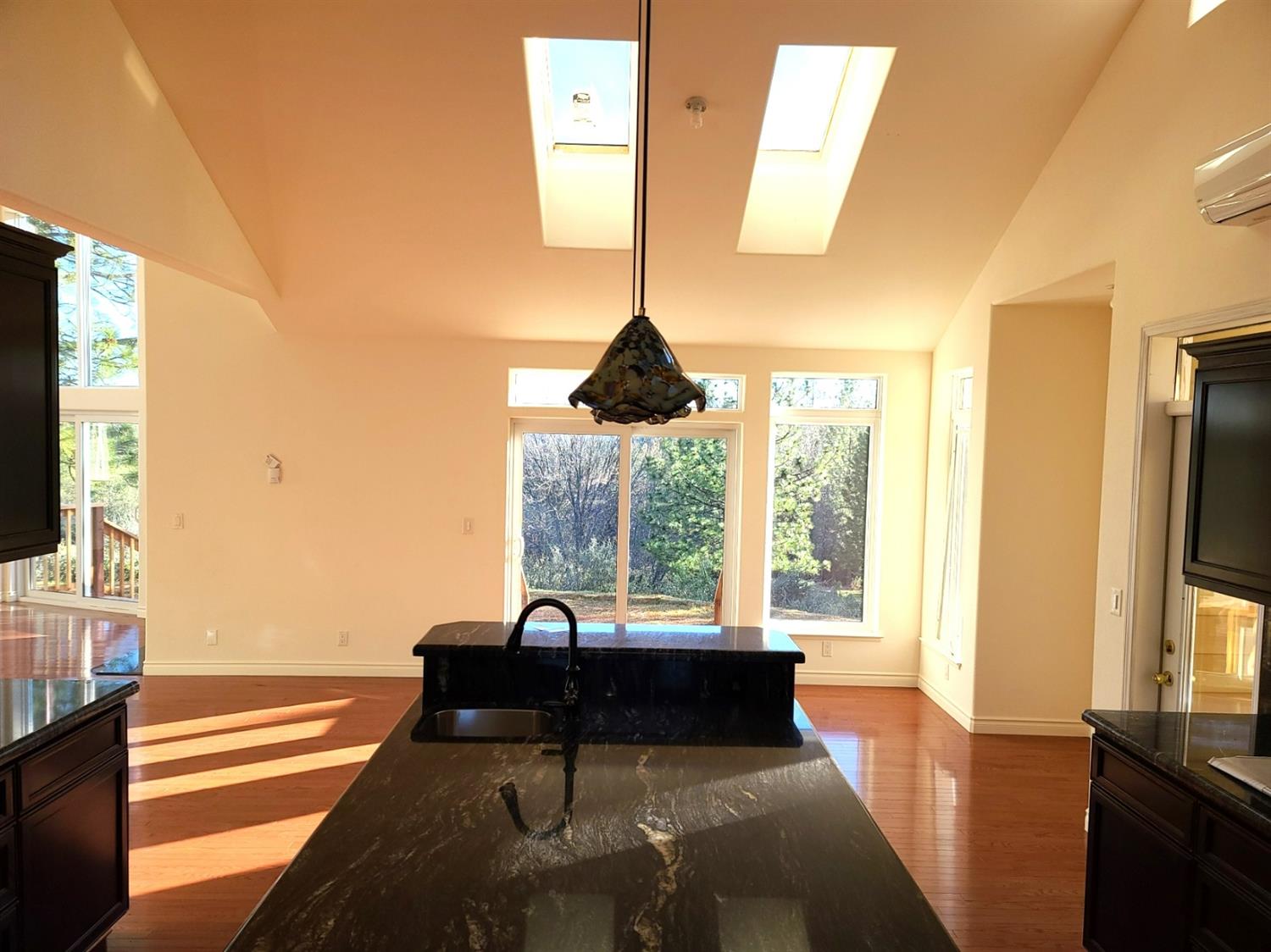 2805 Mason Road Rail Road Flat, CA 95248 - Photo 21 of 75 a living room with fireplace furniture and a flat screen tv