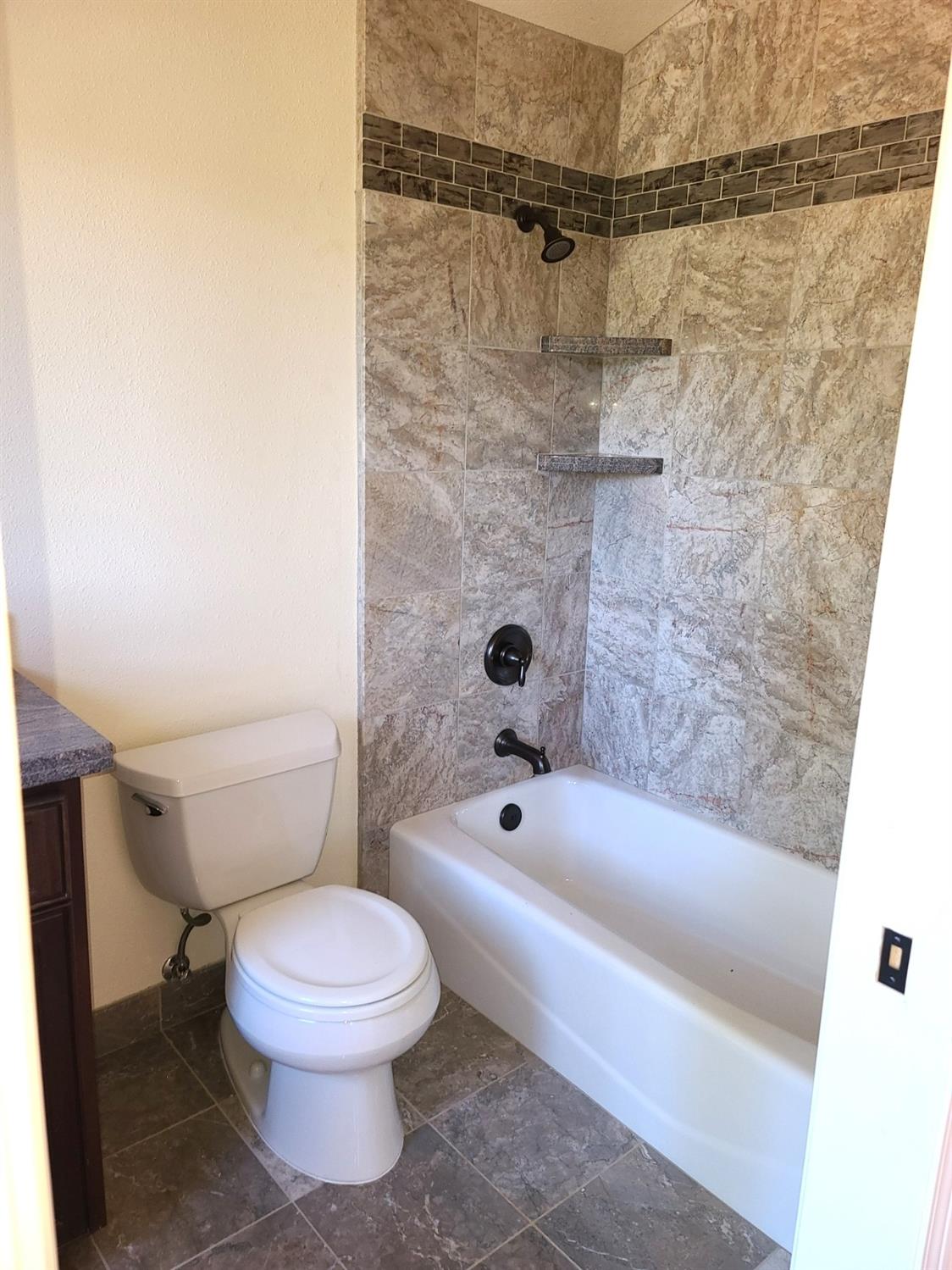 2805 Mason Road Rail Road Flat, CA 95248 - Photo 29 of 75 a bathroom with a toilet and a shower