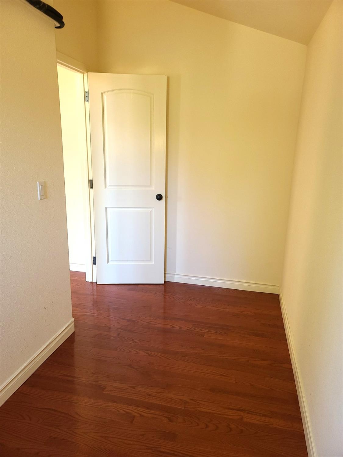 2805 Mason Road Rail Road Flat, CA 95248 - Photo 33 of 75 an empty room with wooden floor and windows