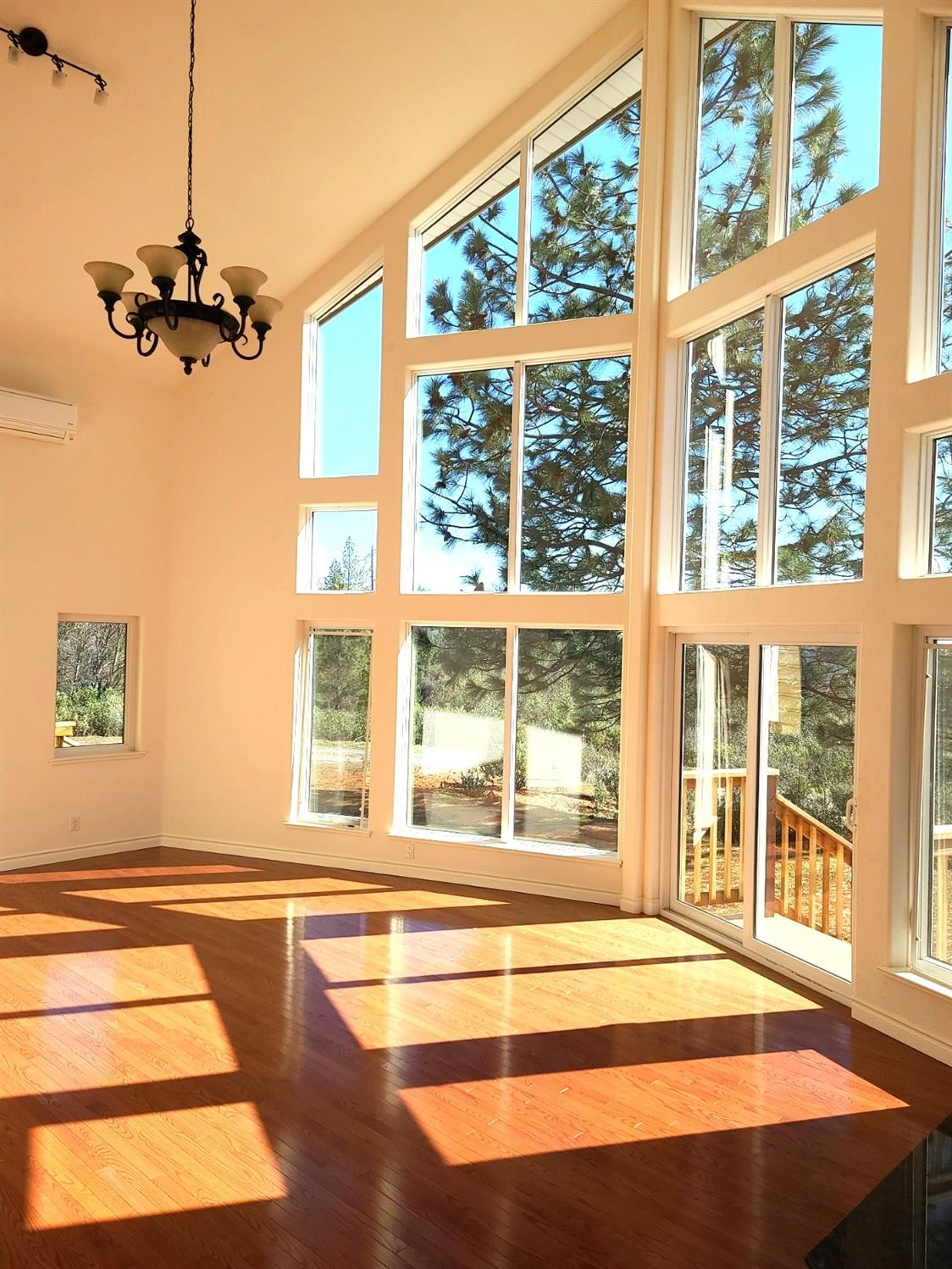 2805 Mason Road Rail Road Flat, CA 95248 - Photo 53 of 75 a view of an empty room with a floor to ceiling windows and a flat screen tv
