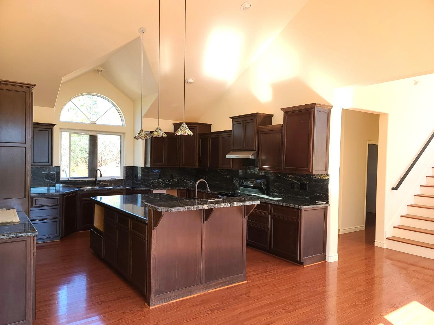 2805 Mason Road Rail Road Flat, CA 95248 - Photo 54 of 75 a kitchen with stainless steel appliances granite countertop a stove a sink and a refrigerator