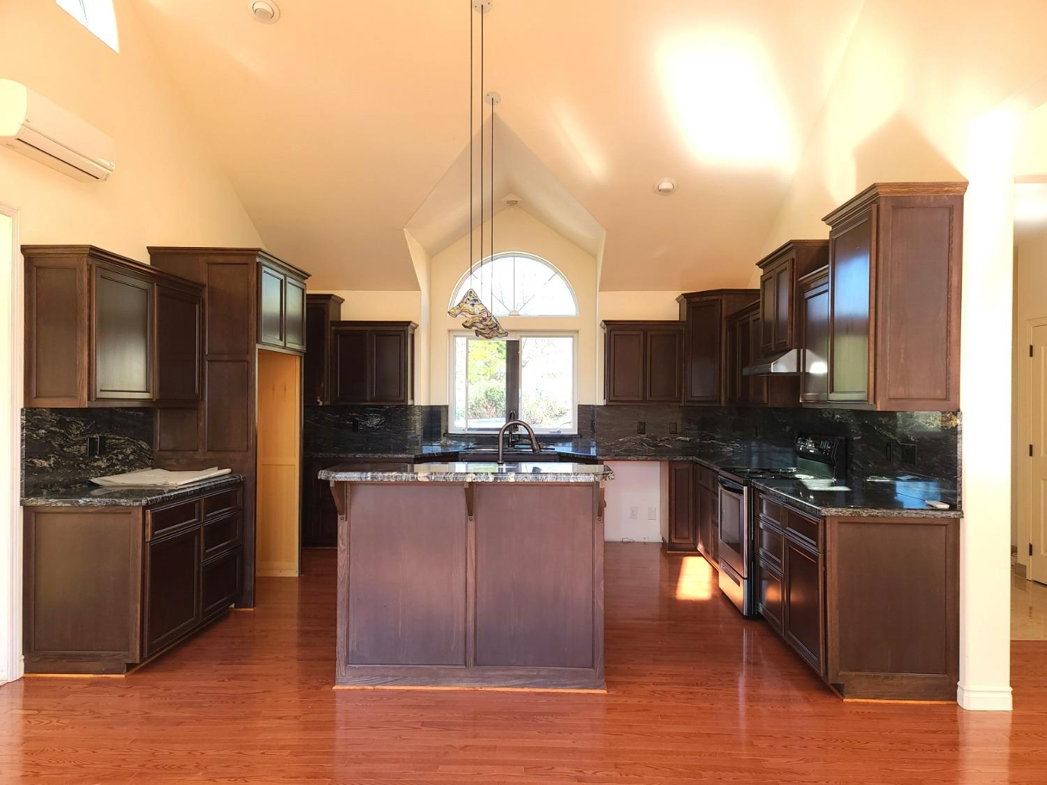 2805 Mason Road Rail Road Flat, CA 95248 - Photo 56 of 75 a kitchen with stainless steel appliances granite countertop a stove refrigerator and a microwave