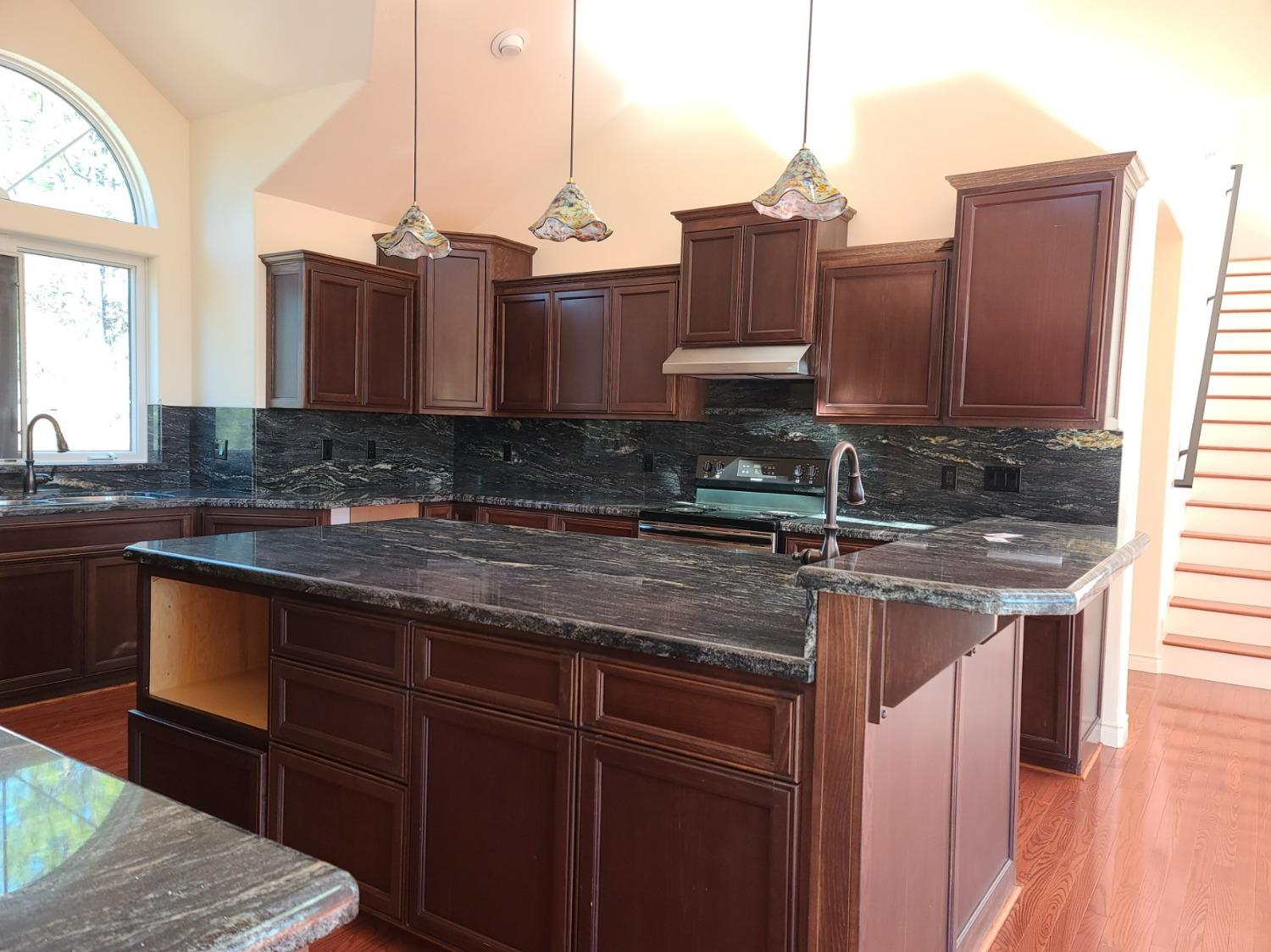 2805 Mason Road Rail Road Flat, CA 95248 - Photo 57 of 75 a kitchen with a sink a counter space and cabinets