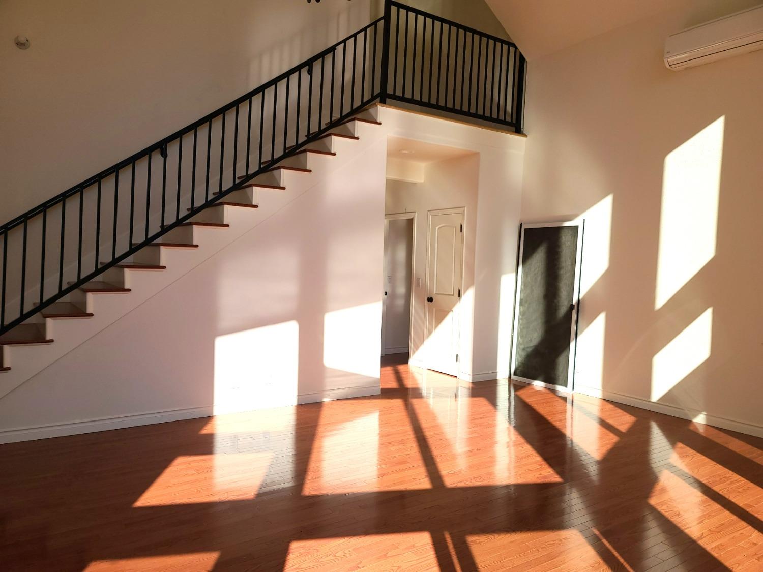2805 Mason Road Rail Road Flat, CA 95248 - Photo 59 of 75 a view of staircase with lots of frames on wall and wooden floor