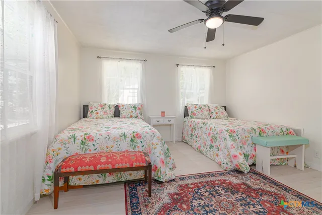 a bedroom with a workspace